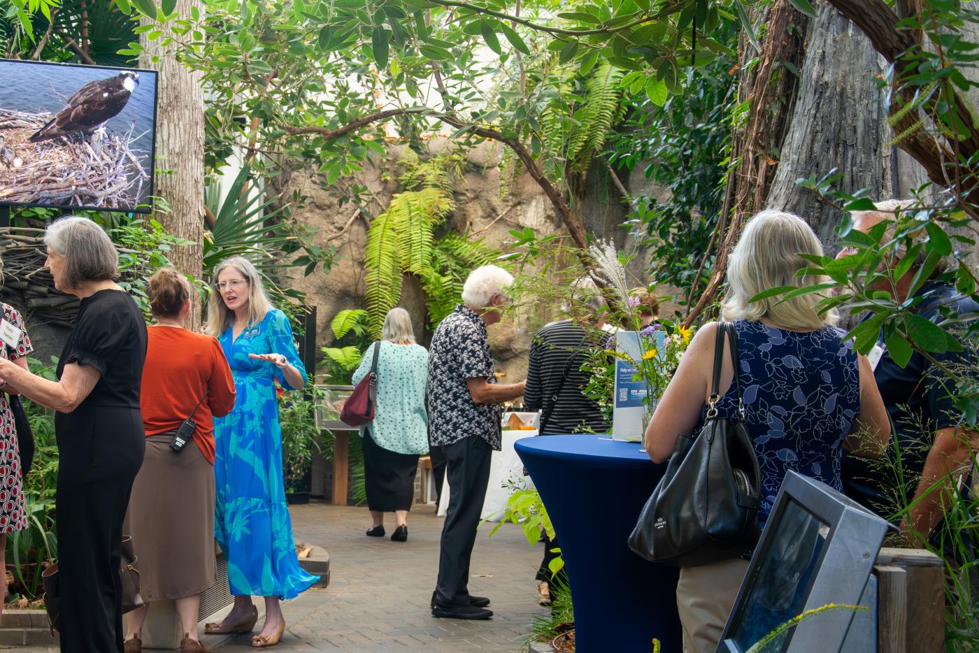 Community members gather for an Oyster Roast at the North Carolina Aquarium on Roanoke Island to celebrate the launch of “Fish, Filter, Food: The Human–Oyster Connection.”