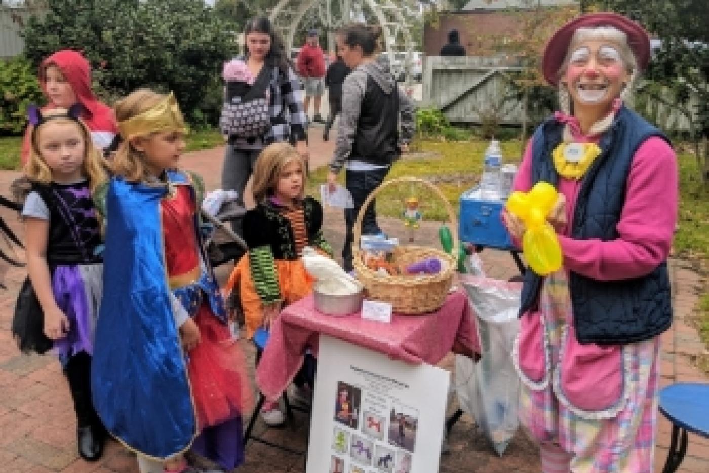 Joy the Clown makes balloon animals for trick-or-treaters during ‘Trick or Treat at the 1897 Poe House.’ This year’s free, family-friendly event will be held Oct. 24 from 11 a.m. to 4 p.m
