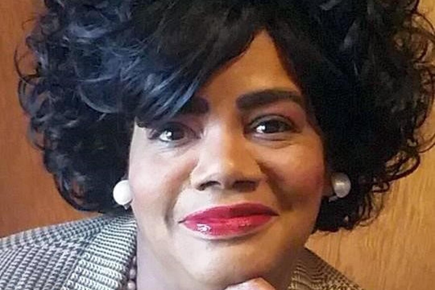 A close up of a woman, Tami Tyree, smiling.