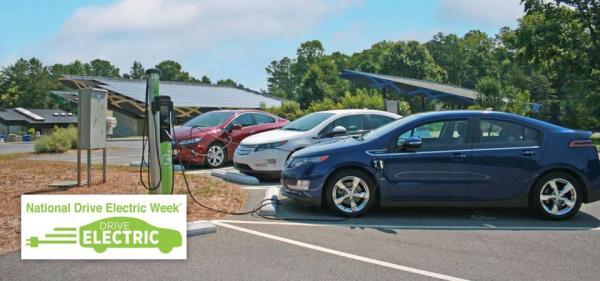 Electric vehicles charging at the NC Zoo.