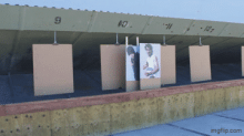 Square targets set up at the end of a shooting range.