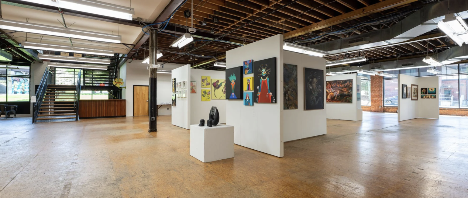 Open art studio with hardwood floors