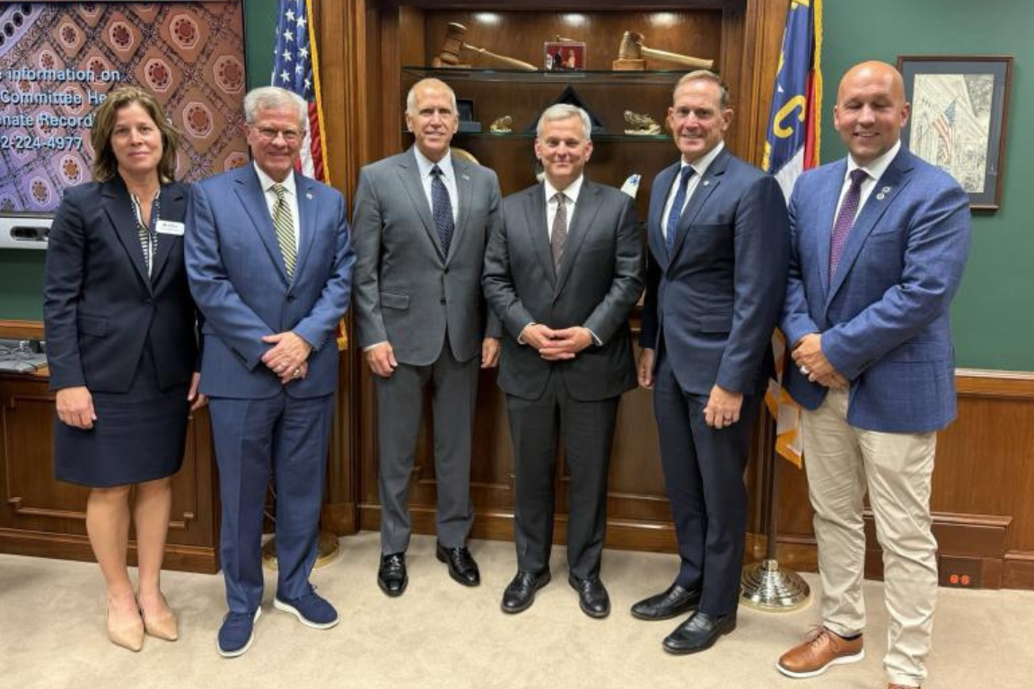 state and local leaders posed for a photo