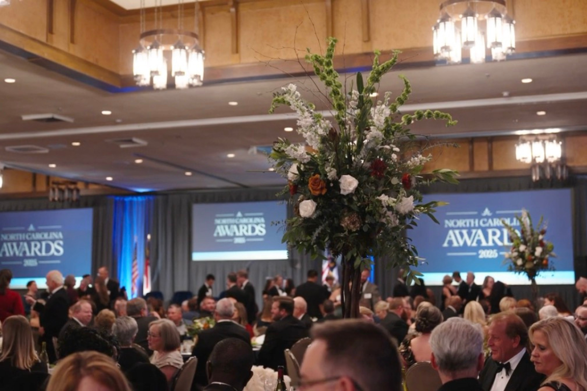 Banquet hall holding hundreds of seated people