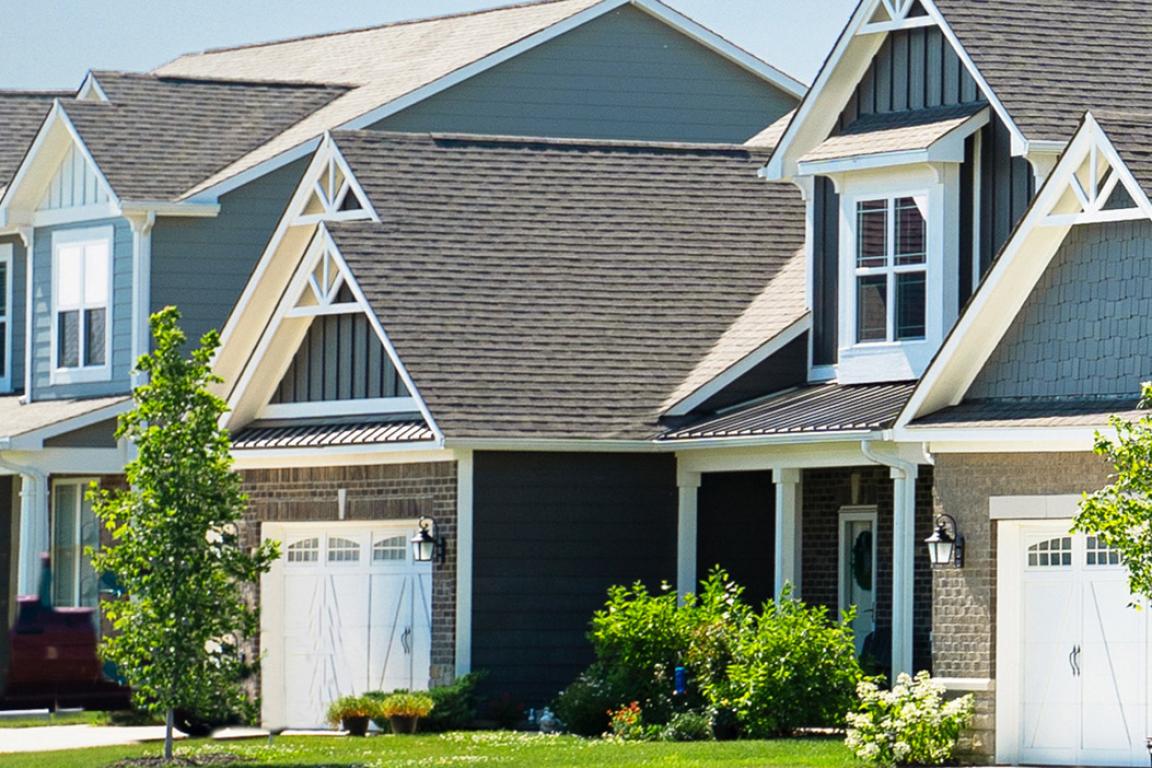 Street view of middle-class, suburban neighborhood homes.
