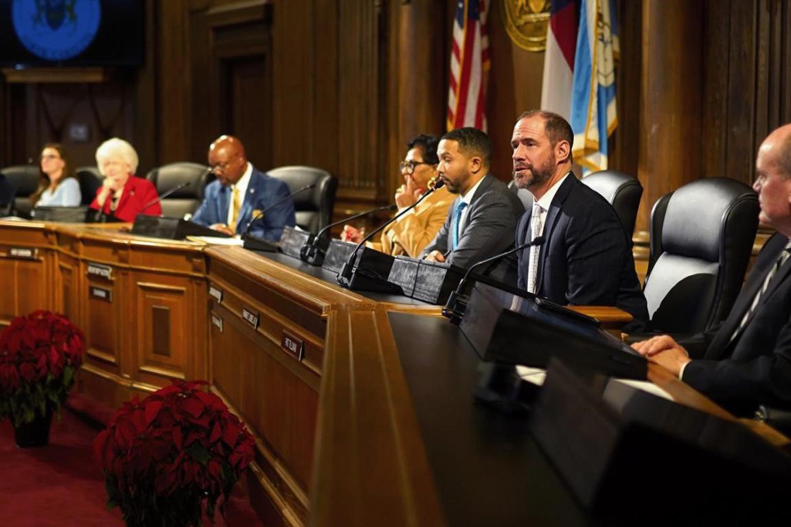The Board of Commissioners seated in the board chambers during a regular meeting.