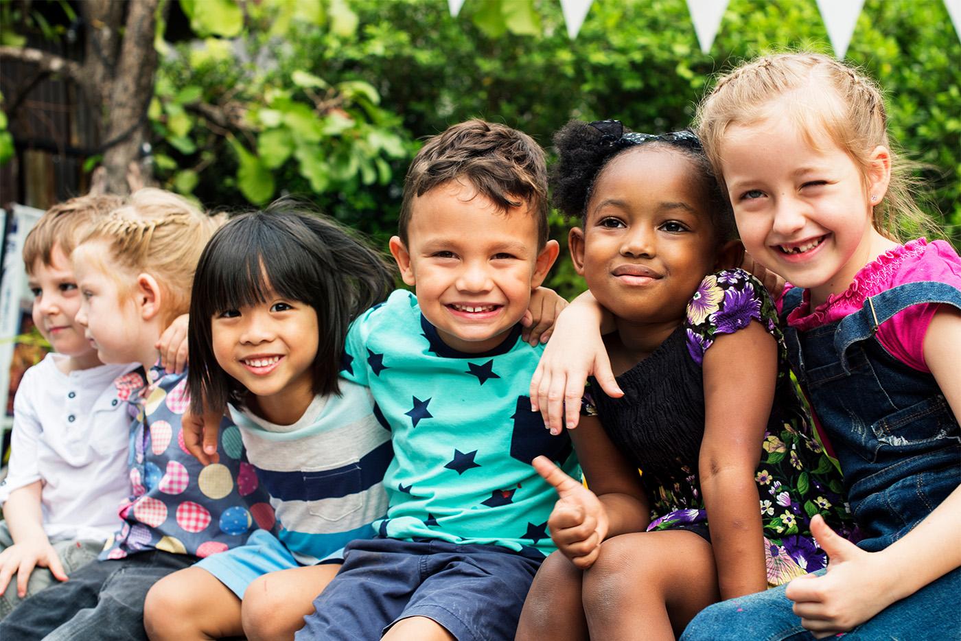 Group of smiling kindergarten kids.