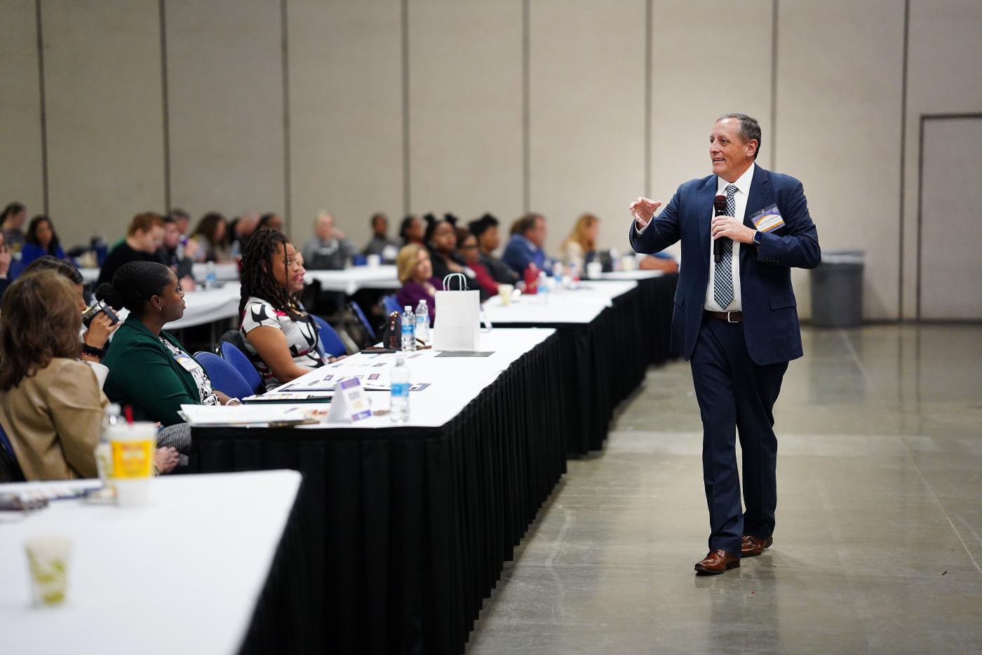 Man speaking at conference