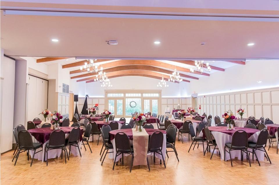 The Banquet Room at Bur-Mil Park Event Center set up with tables and chairs for an event.