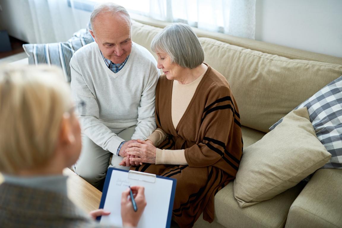Older couple receiving counseling.