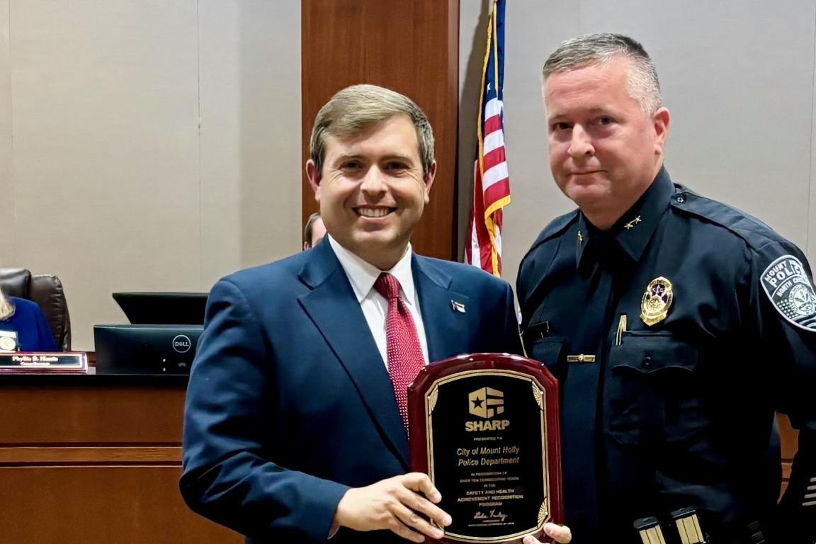 Farley presents SHARP award