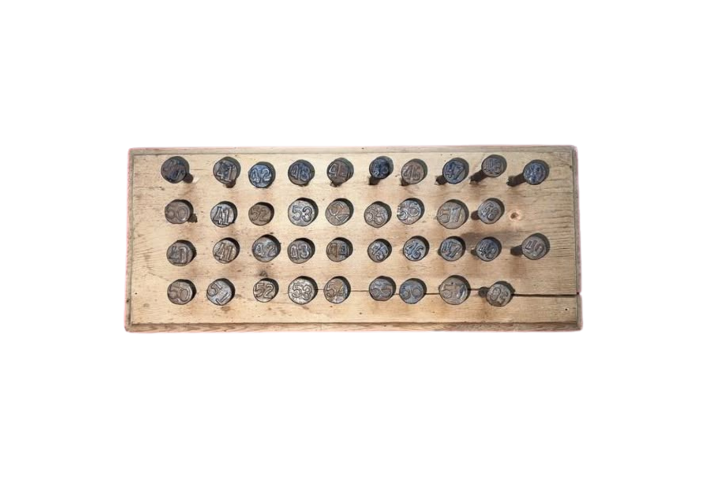 wooden board with nails with numbers on them