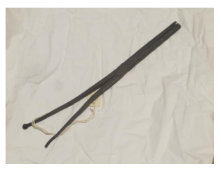 curling iron against a white background