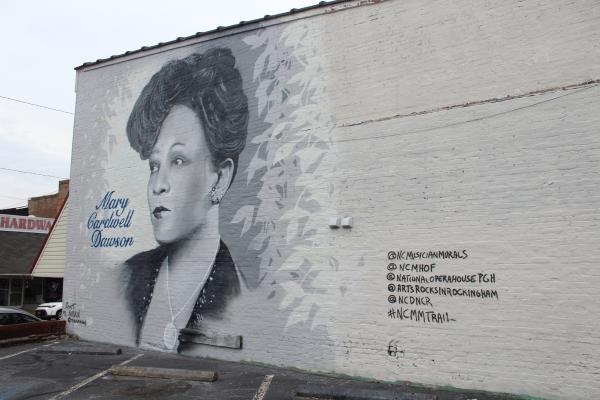 Mural of Mary Cardwell Dawon on the side of a buliding in Madison, NC