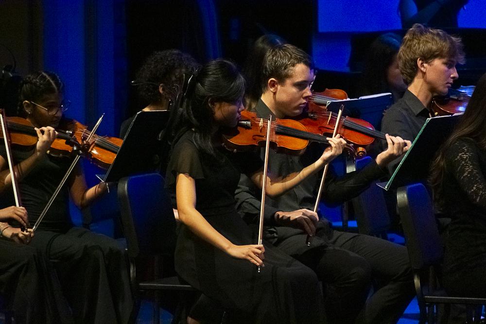 GS students perform in an orchestra concert.