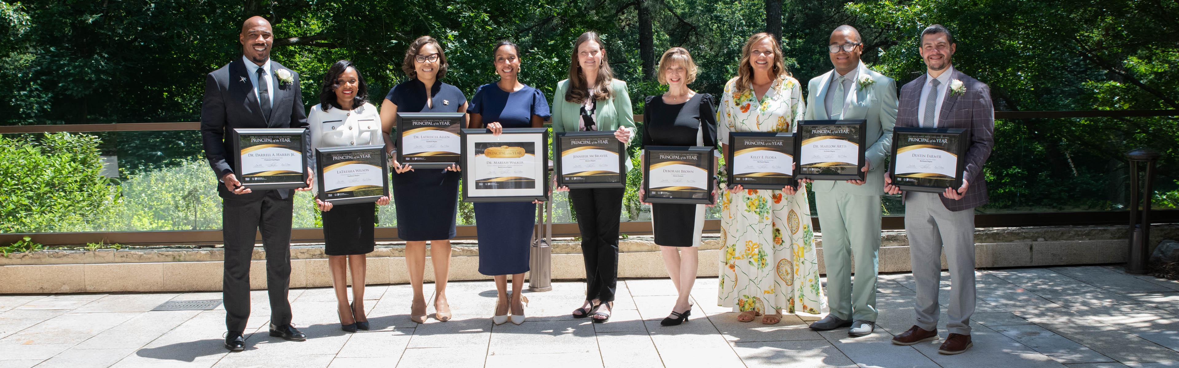 2026 NC Principal of the Year winner with other finalists