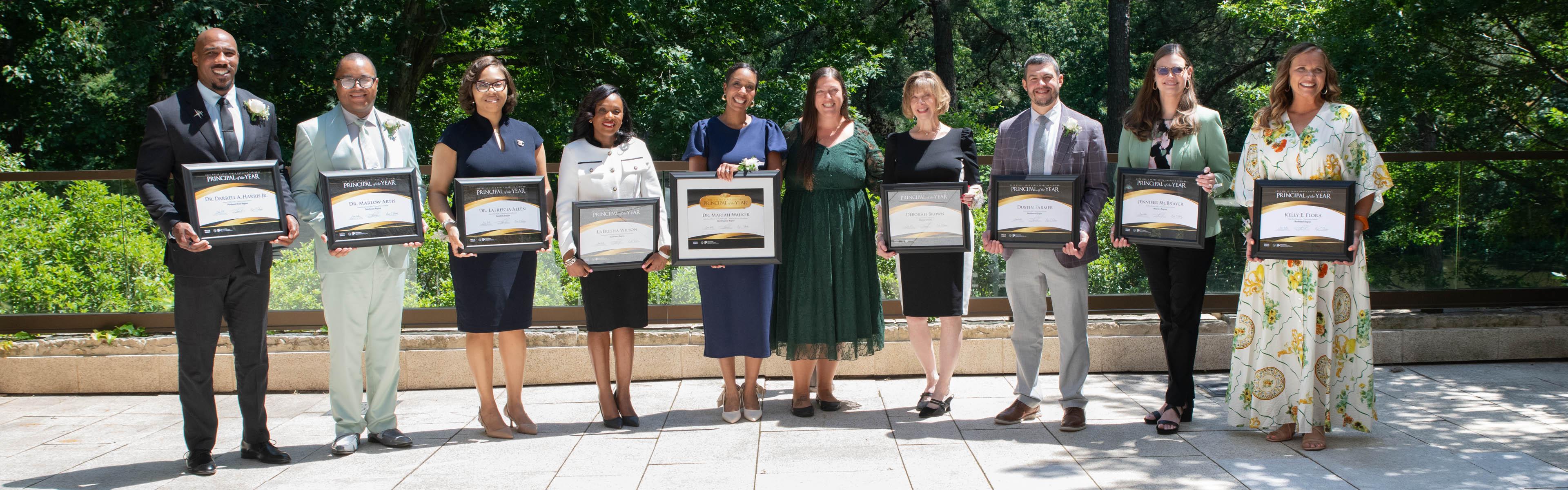 2026 NC Principal of the Year winner with other finalists
