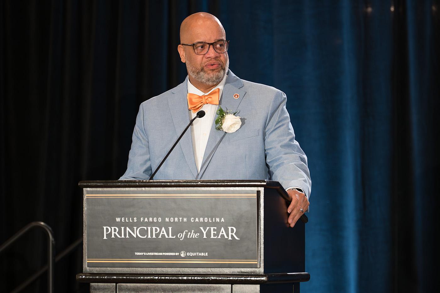 Jason Johnson gives an acceptance speech in May at the 2025 Wells Fargo NC Teacher of the Year Ceremony