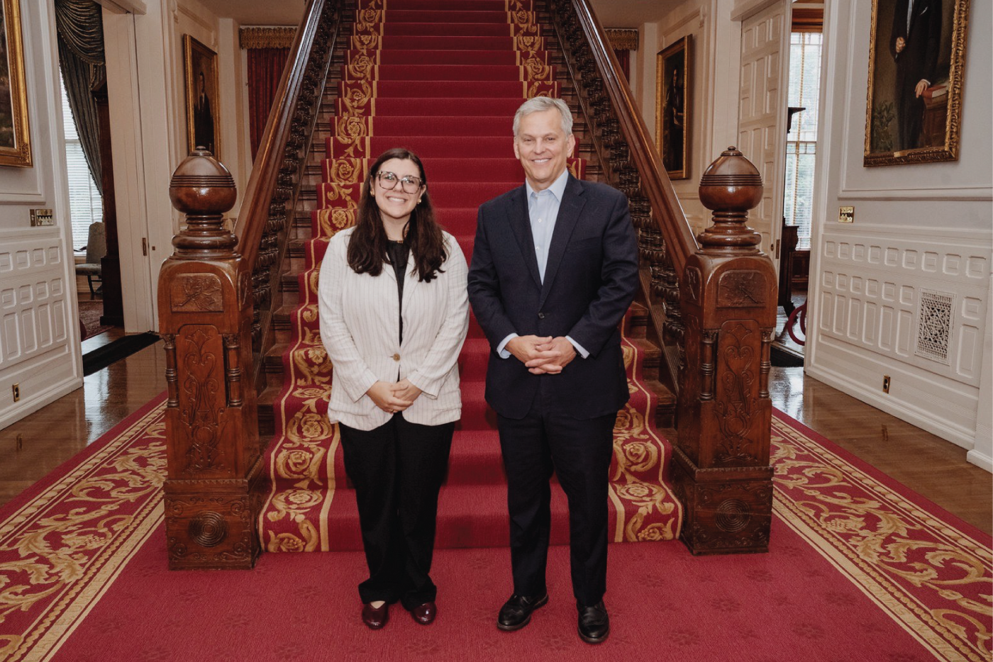 Victoria Jimenez-Higdon poses with Governor Josh Stein.