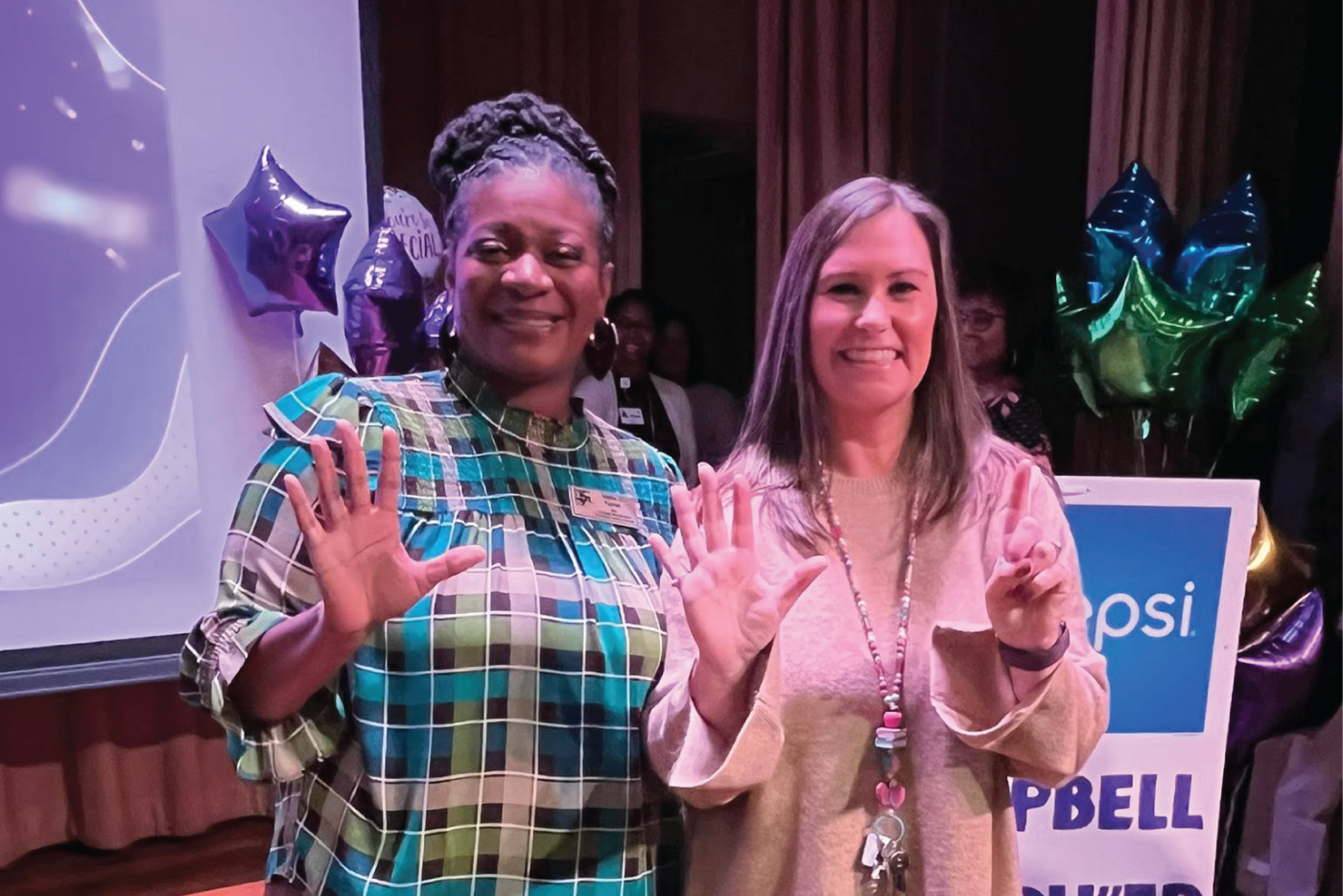 Stephanie Lane is presented with the Charter School Teacher of the Year recognition.