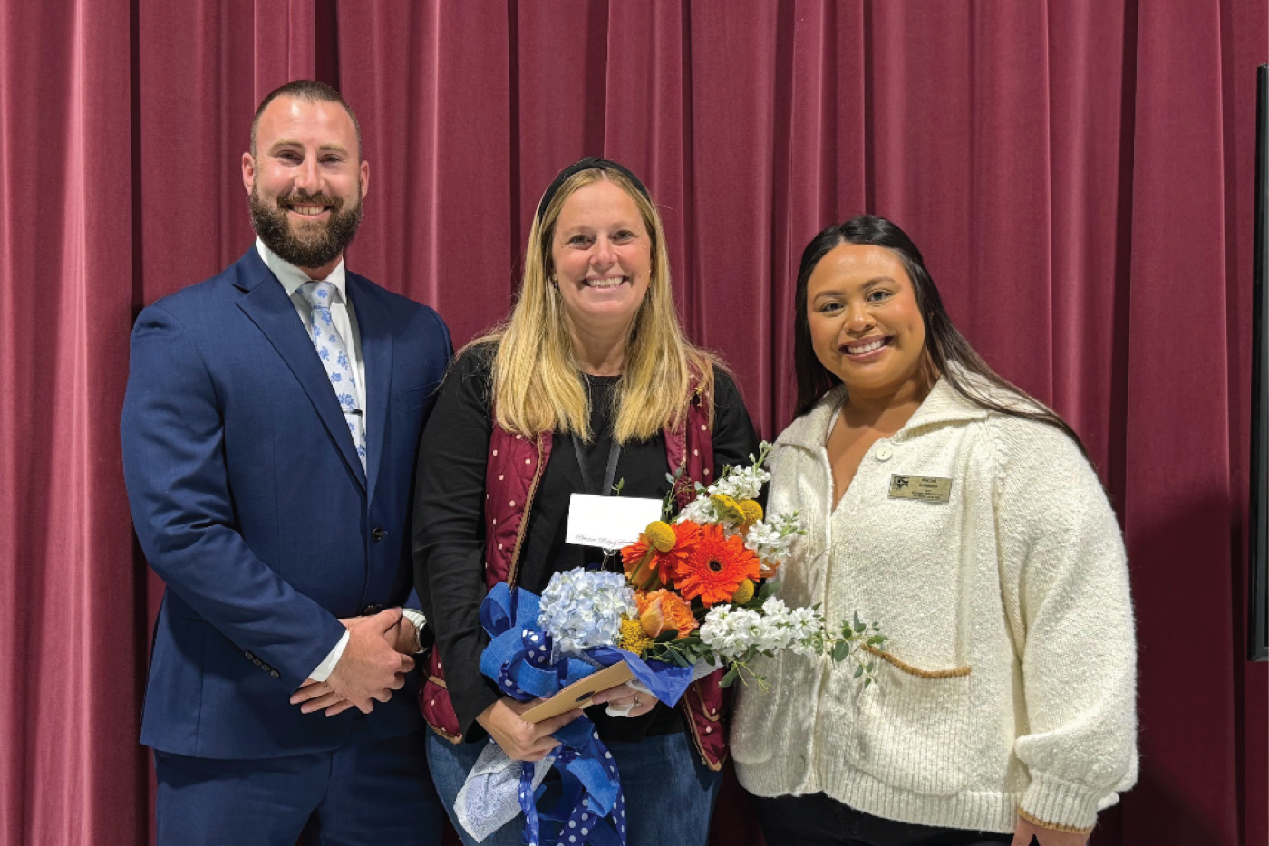 Stephanie Lane is presented with the Charter School Teacher of the Year recognition.