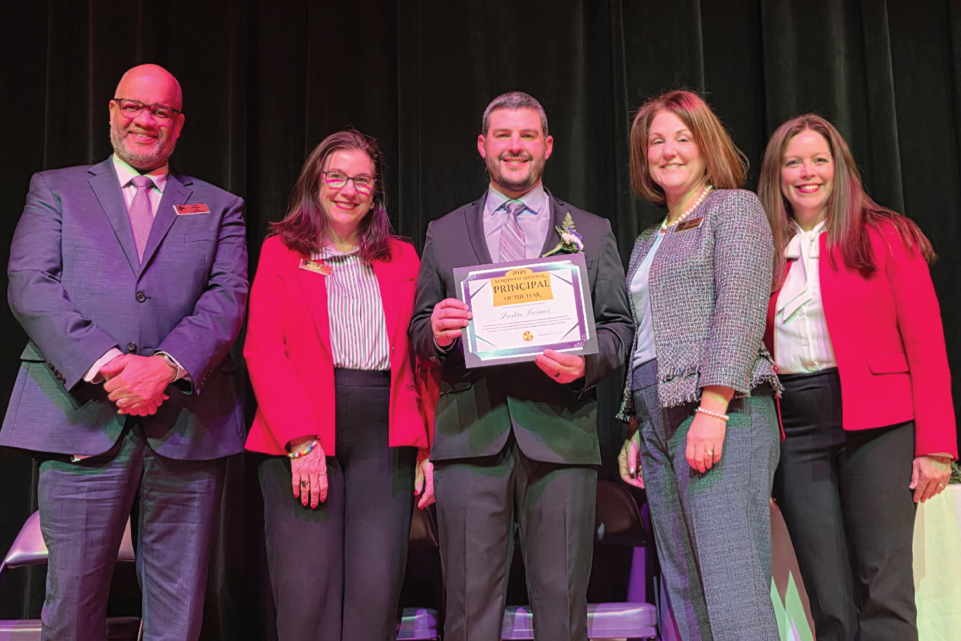 Dustin Farmer is recognized as the Northwest Region Principal of the Year.