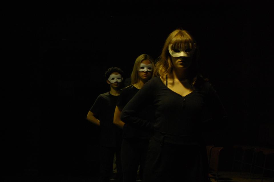 Theater students perform as an emsemble 