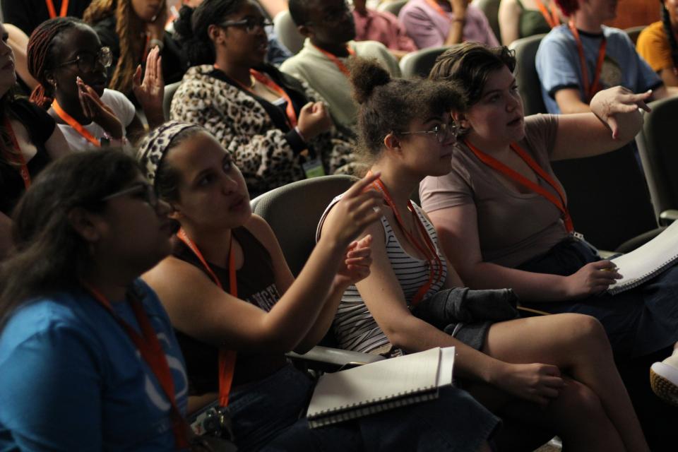 GS students attending a seminar discuss ideas