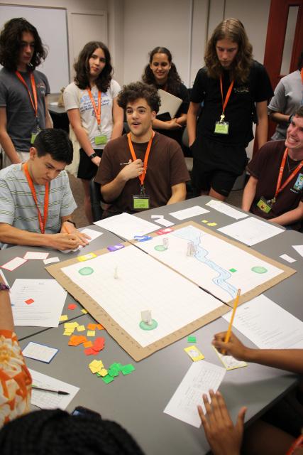 GS Math students illustrate a concept using a board game