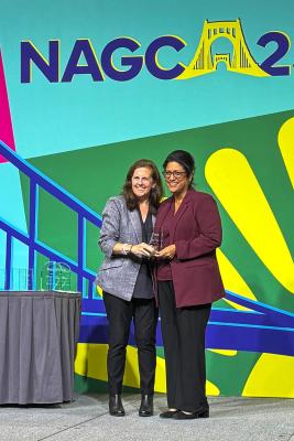Shah-Coltrane, right, receives the Belin Award from NAGC President Catherine Little.
