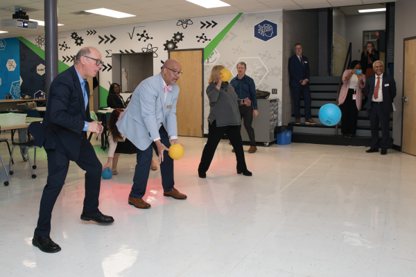  Johnson, center in blue, participates in a game at the Vance County Schools Center for Innovation.