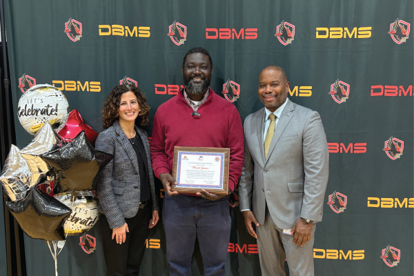 Manzell Spencer is recognized as the Sandhills Teacher of the Year.