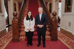 Victoria Jimenez-Higdon poses with Governor Josh Stein.
