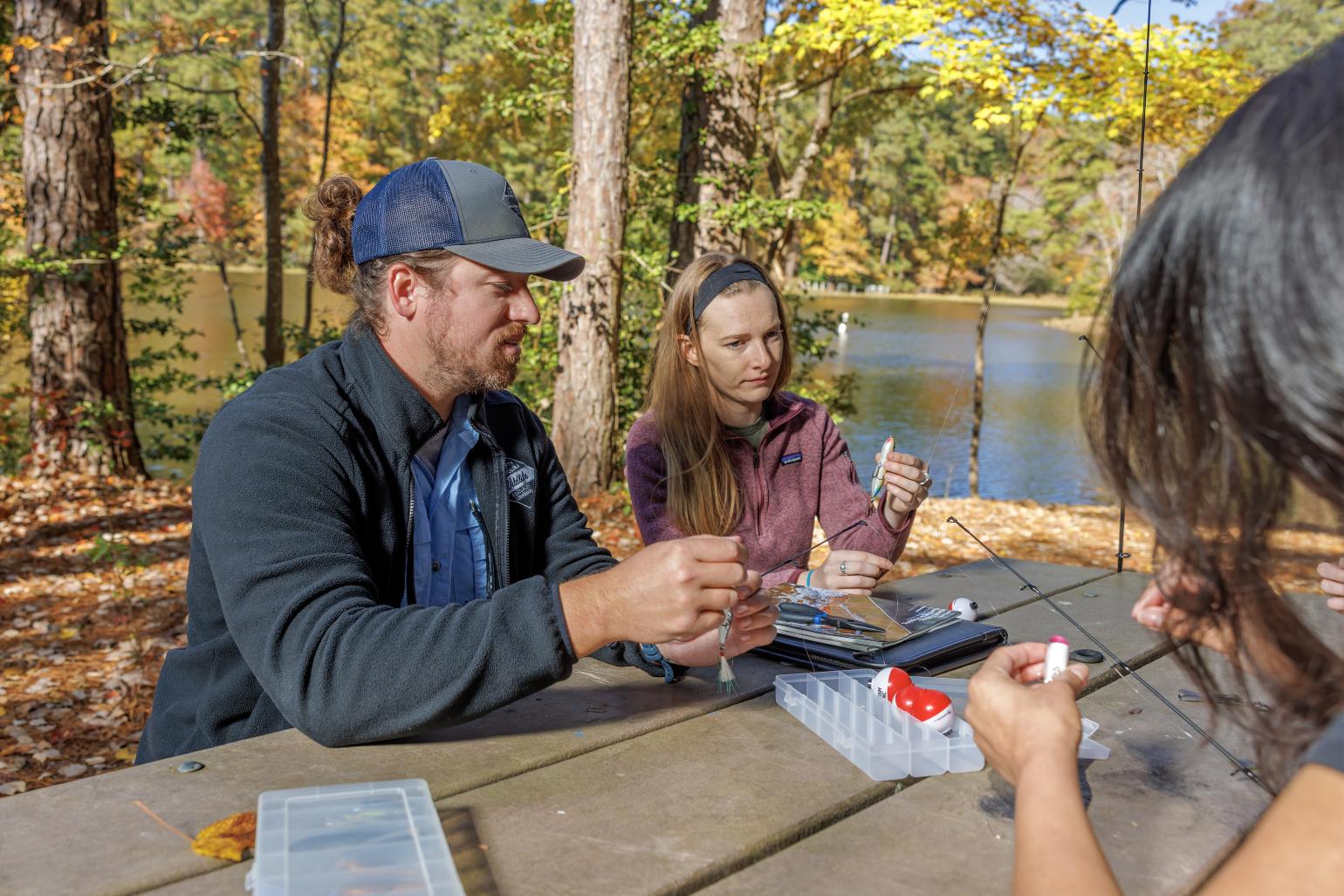 Matt Rieger teaches how to attach a lure to a fishing reel