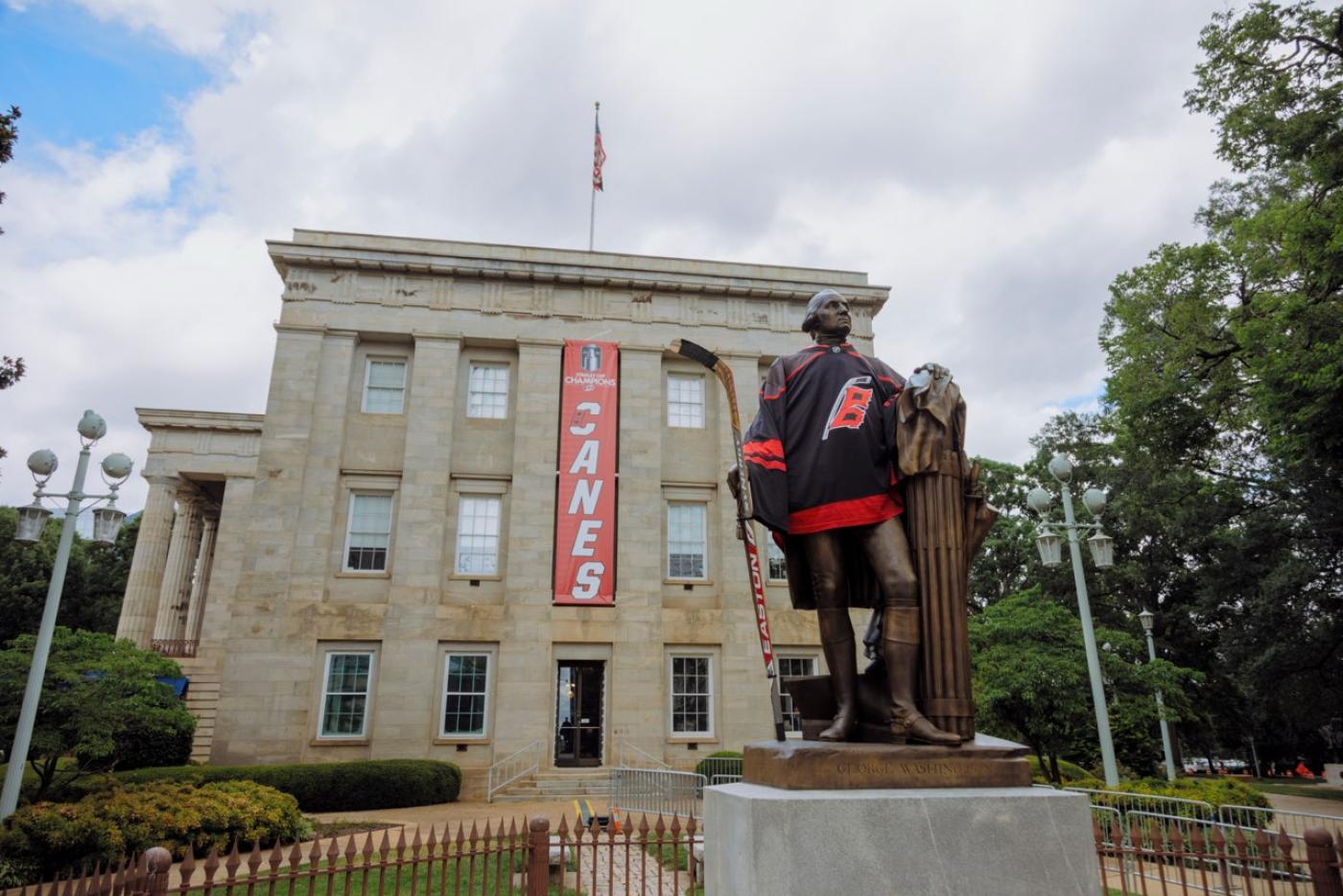 NC Capitol Building with Hurricanes hockey gear
