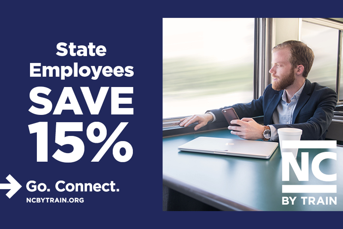 State employees save 15%. Man working while riding on the train.