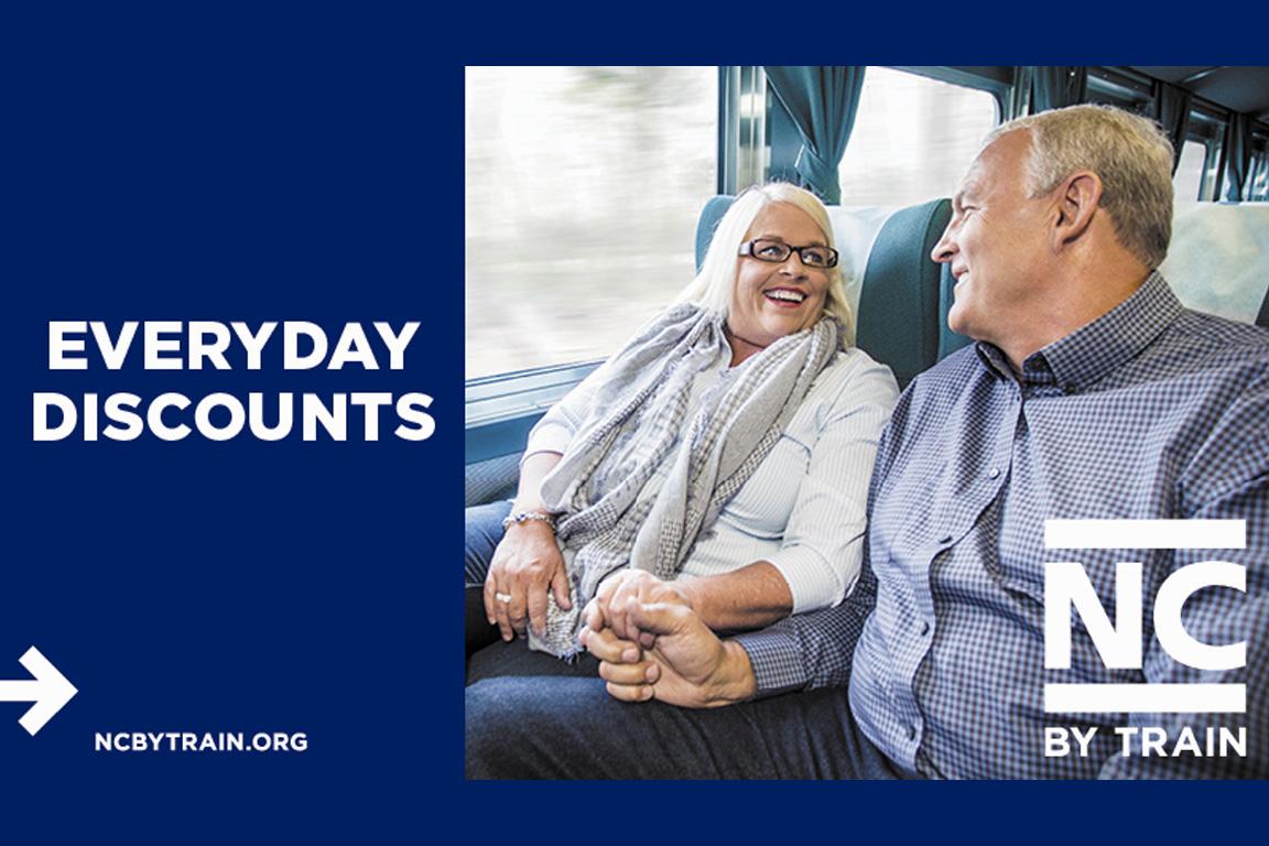 Everyday discounts. Older couple, man and woman, sitting on the train together.
