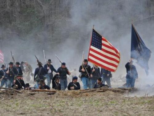Re-enactors Carry the Union Flag into Battle at Bentonville Battlefield