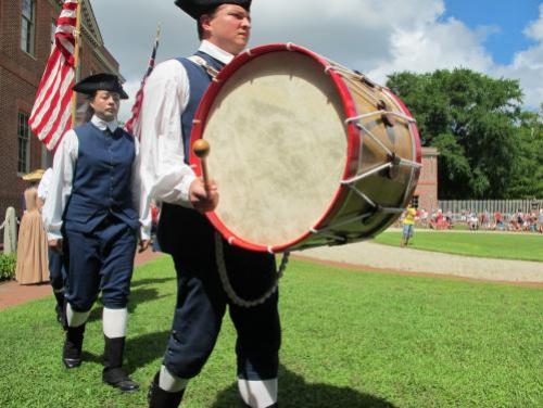 Interpreters Walk Along a Dirt Road at Durham's Duke Homestead