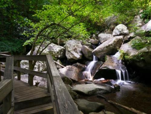 A waterfall trickles into the Jacob Fork River at South Mountains State Park