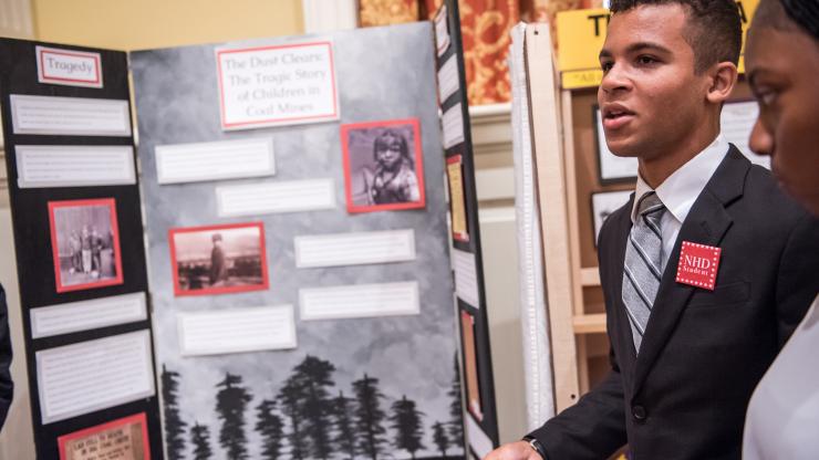 Two N.C. History Day students presenting their exhibit project.