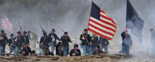 Re-enactors Carry the Union Flag into Battle at Bentonville Battlefield