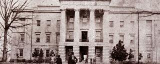 Governor David S. Reid stands in front of the N.C. State Capitol, circa 1861 Governor David S. Reid stands in front of the N.C. State Capitol, circa 1861