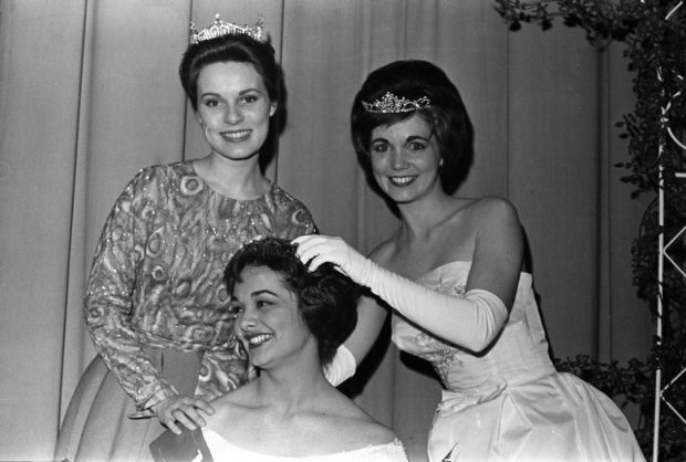 Fletcher (left) looks on as Carolyn Byrd is crowned Miss Raleigh in 1962. Image from the News & Observer