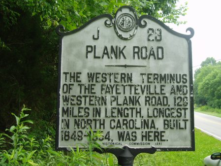 Plank Road - The western terminus of the Fayetteville and western plant road, 129 miles in length, longest in North Carolina, built 1849-1864, was here.