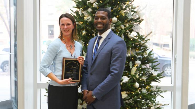 DWM Employee of the Year Elizabeth Werner -- Unparalleled Dedication and Enthusiasm That Knows No Bounds DWM Employee of the Year Elizabeth Werner with DEQ Secretary Michael Regan
