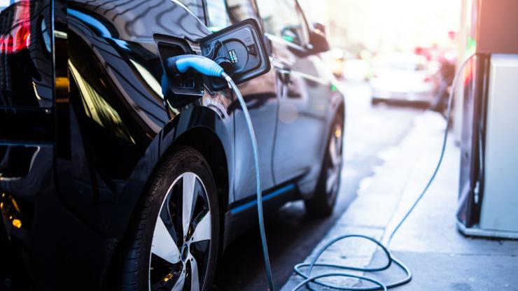 Vehicle plugged into charging station