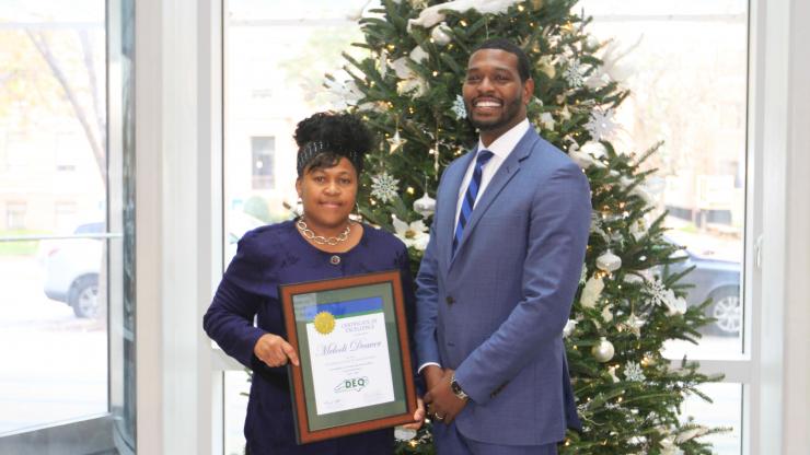 DWM Employee of the Year Finalist Spotlight: Melodi Deaver -- An Integral Part of the DWM Team DWM Employee of the Year Finalist Melodi Deaver with DEQ Secretary Michael Regan