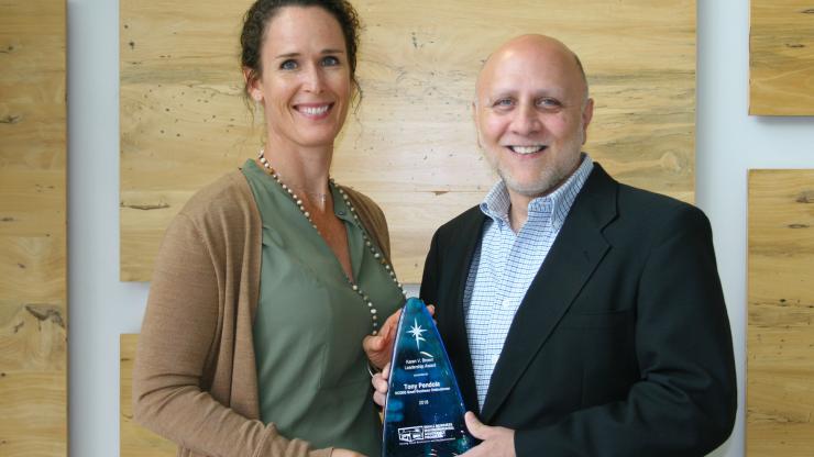 Tony Pendola, left, received the Karen V. Brown Leadership Award from the national network of Small Business Environmental Assistance Programs