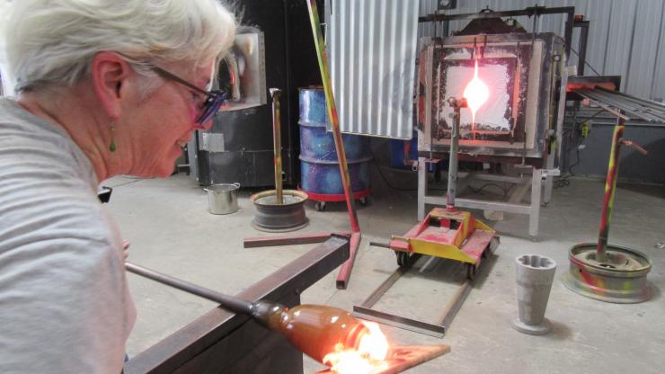 Juyd McManus with paddle on fire using landfill gas turned into energy Juyd McManus with paddle on fire using landfill gas turned into energy